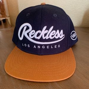 Men’s Young and Reckless Hat Adjustable- New